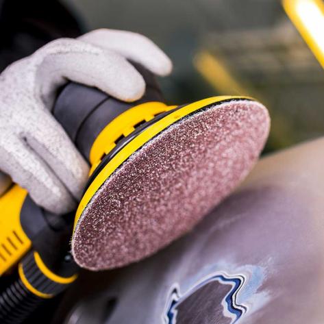 Action shoot of the dust free sanding obtained using the Mirka 125mm Abranet ACE HD Sanding Disc.